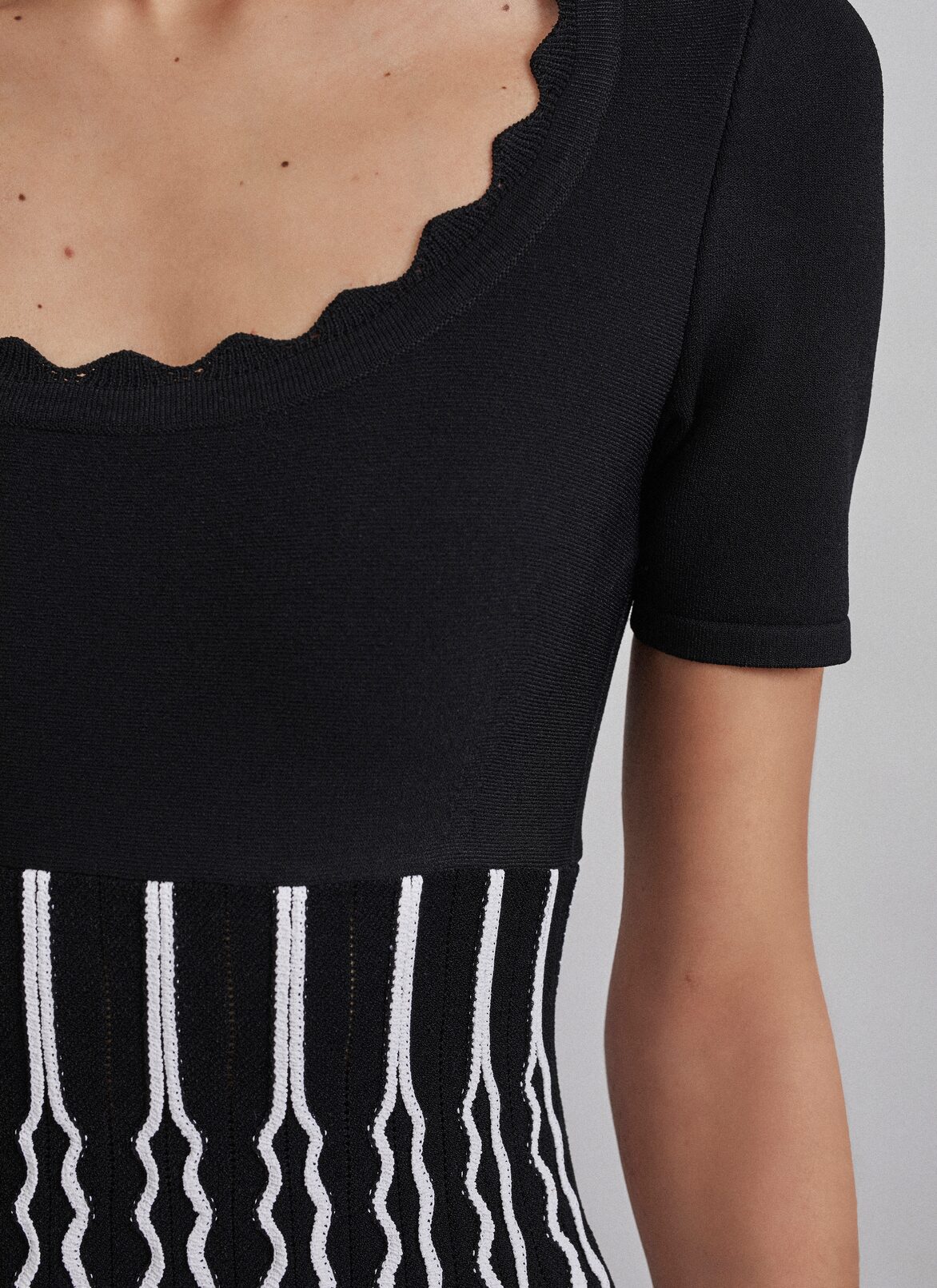 Dresses ALAÏA BLACK/WHITE DRESSES